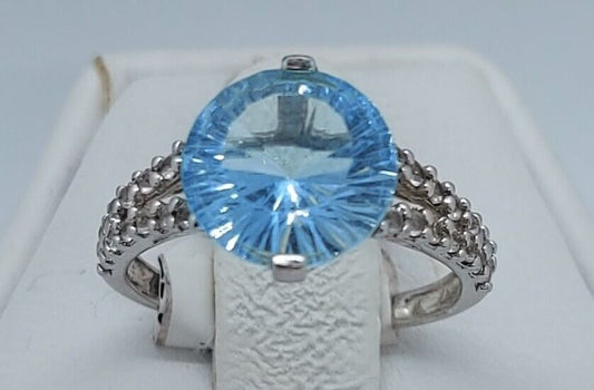 (N13604-3) 10K White Gold Ladies Ring 1 Blue Stone